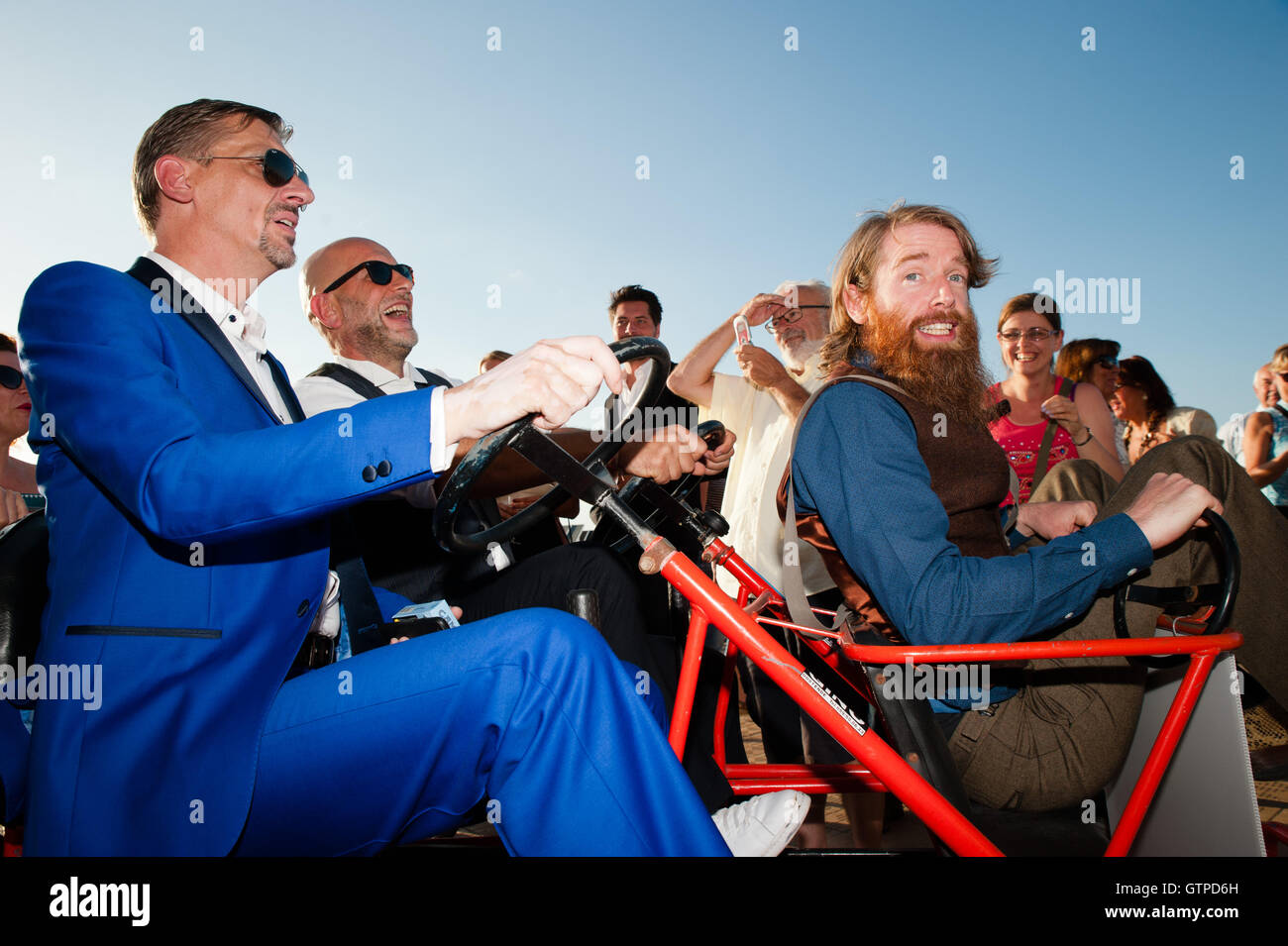Ostend, Belgium. 09th Sep, 2016. Nic Balthazar and some of the cast from his new film 'Happy' race in a cart at the start of the film festival in Ostend. Credit:  Frederik Sadones/Pacific Press/Alamy Live News Stock Photo
