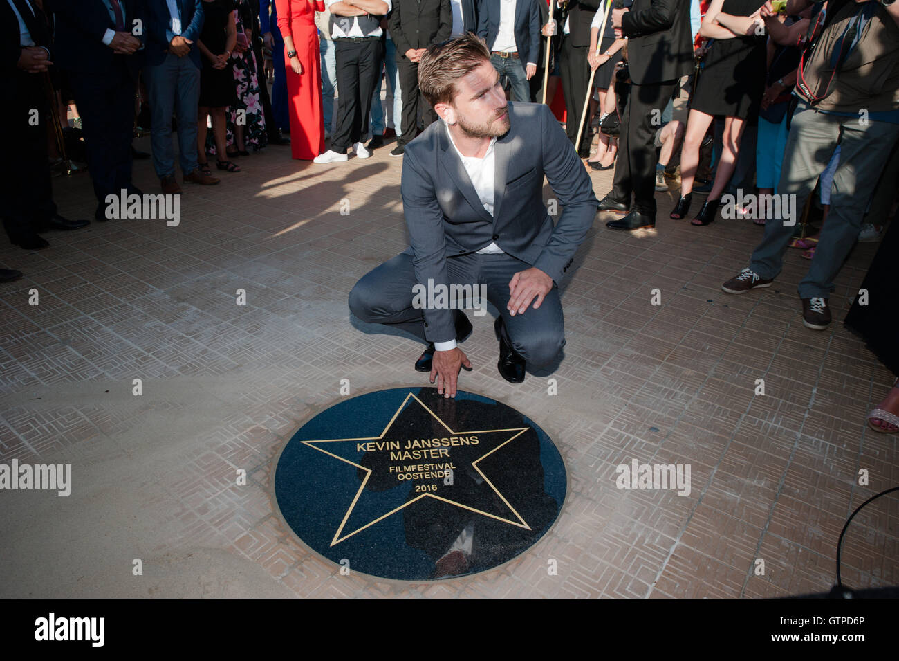Ostend, Belgium. 09th Sep, 2016. Kevin Janssens poses next to his star at the boulevard in Ostend for the start of the film festival in Ostend, Belgium. Credit:  Frederik Sadones/Pacific Press/Alamy Live News Stock Photo
