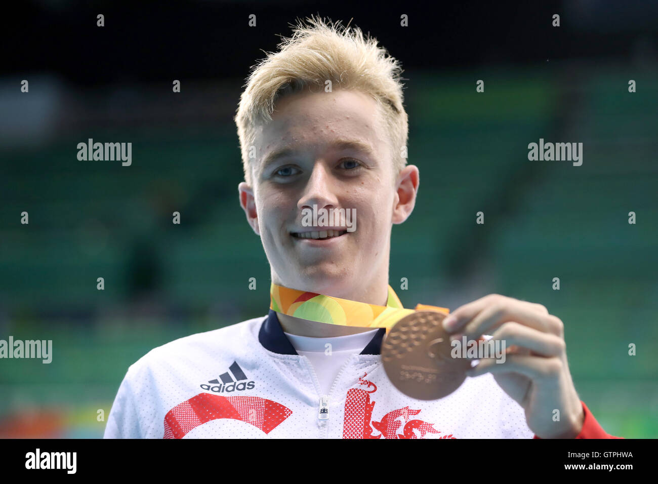 Great Britain's Lewis White with his Bronze medal during the medal