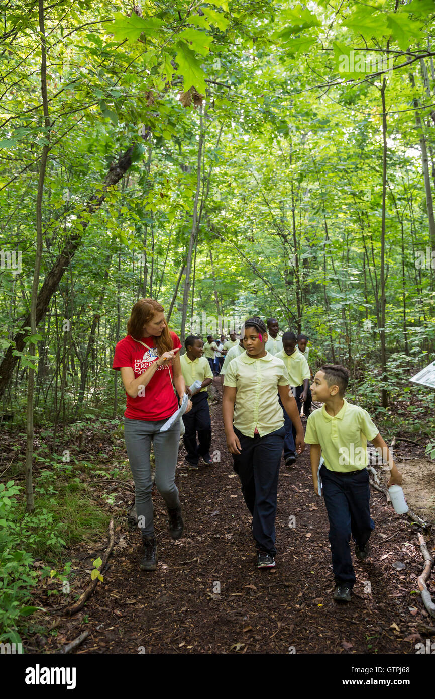 Detroit, Michigan - Fifth grade students from Dixon Elementary school, hike on the Stone Bridge Nature Trail in Rouge Park. Stock Photo