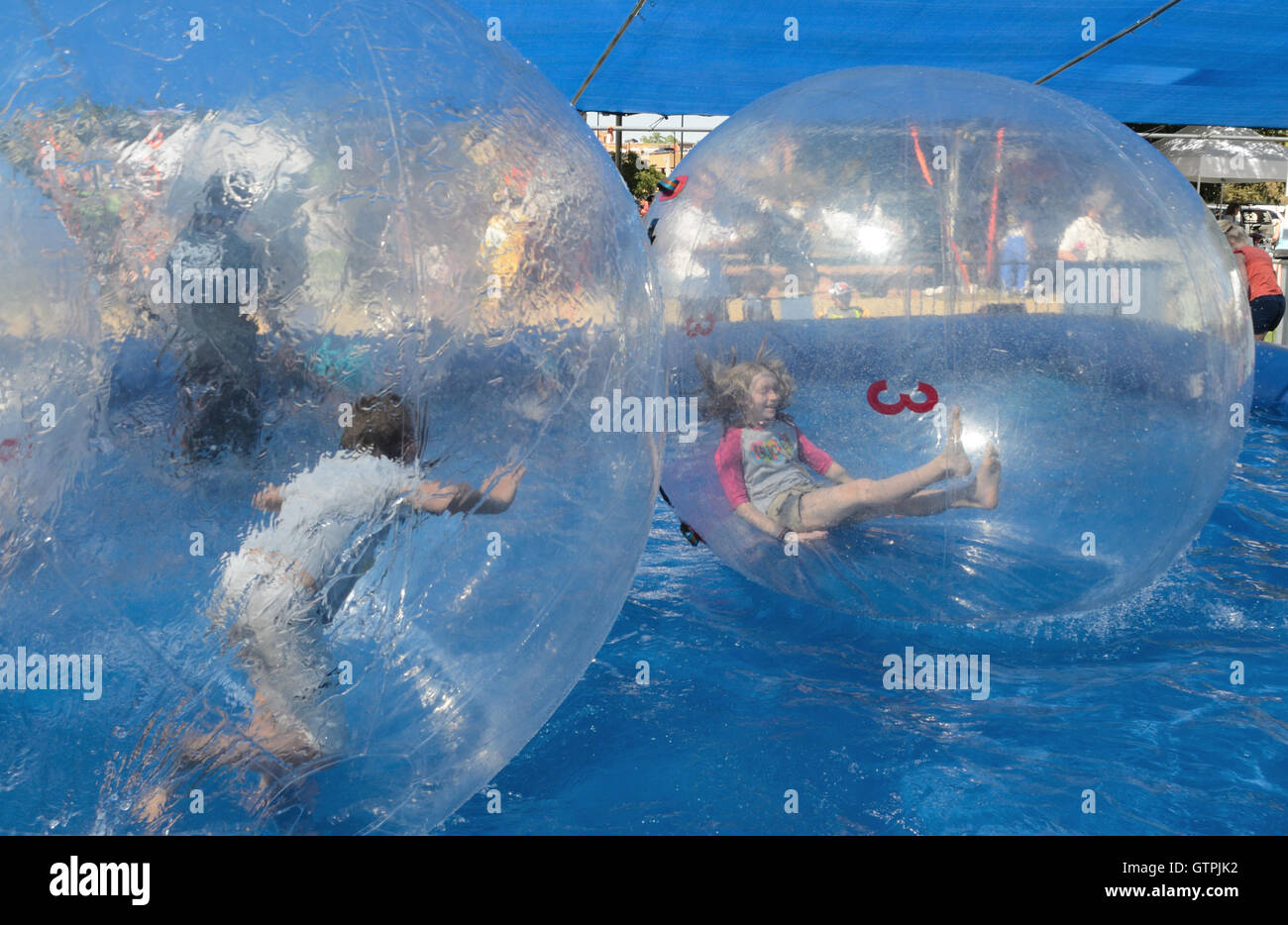 Falling down in a bubble for the fun of it Stock Photo