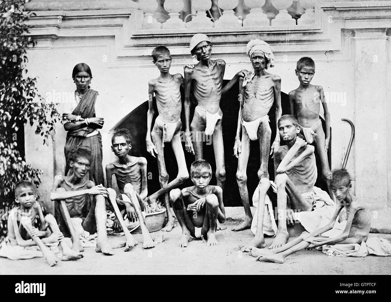 BANGALORE FAMINE 1876-1878  Emaciated group waiting for aid relief. Photo: India House Stock Photo