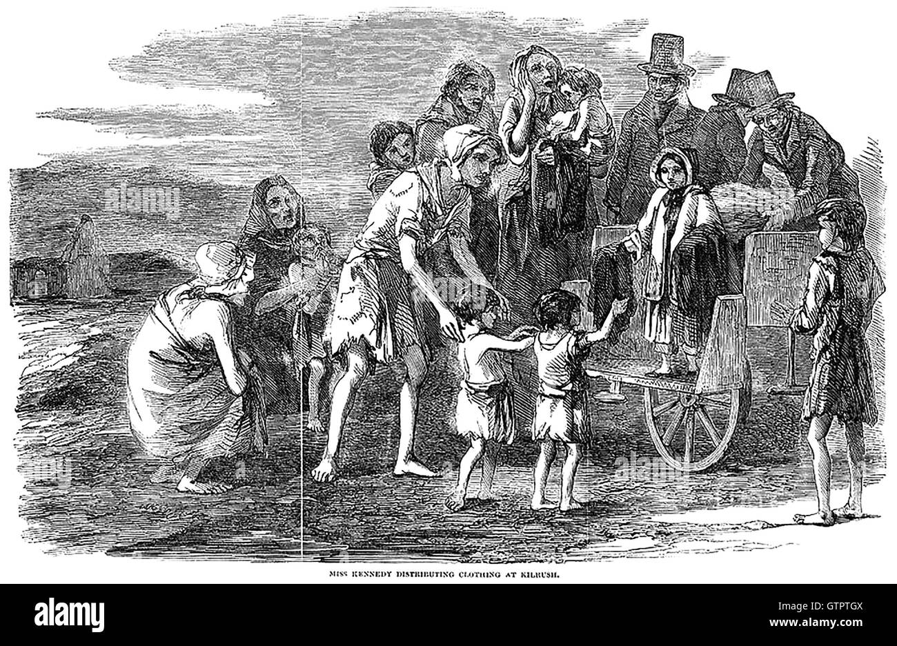 IRISH FAMINE  'Miss Kennedy distributing clothing' From the Illustrated London News series on 'Condition of Ireland- Illustrations of the new Poor-Law'  December 1849 Stock Photo