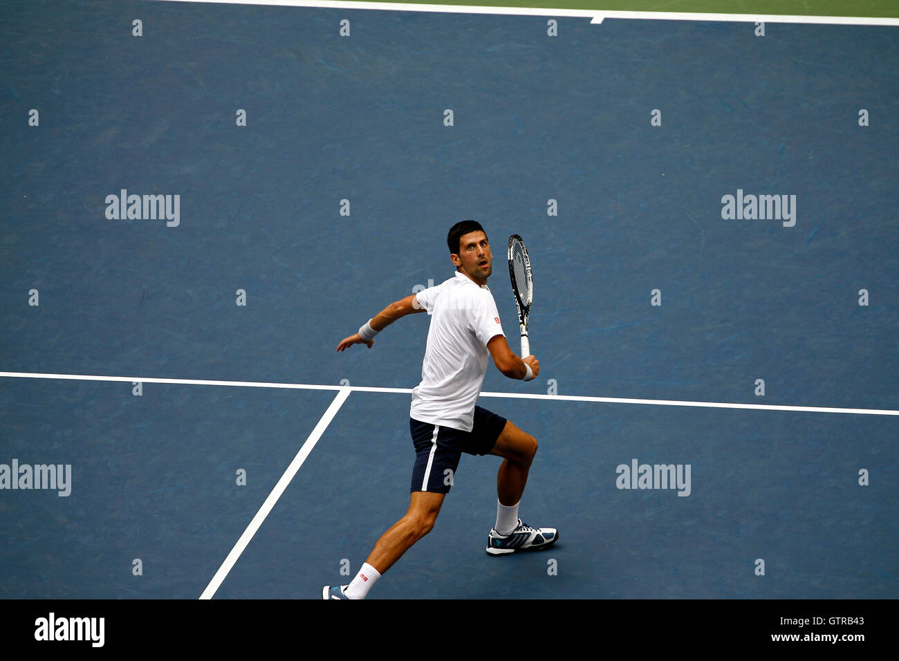 New York, United States. 09th Sep, 2016. Novak Djokovic tracks a lob during his semi final match against Gael Monfils of France at the United States Open Tennis Championships at Flushing Meadows, New York on Friday, September 9th. Djokovic won the match in four sets to advance to the final Credit: © Adam Stoltman/Alamy Live News  Stock Photo