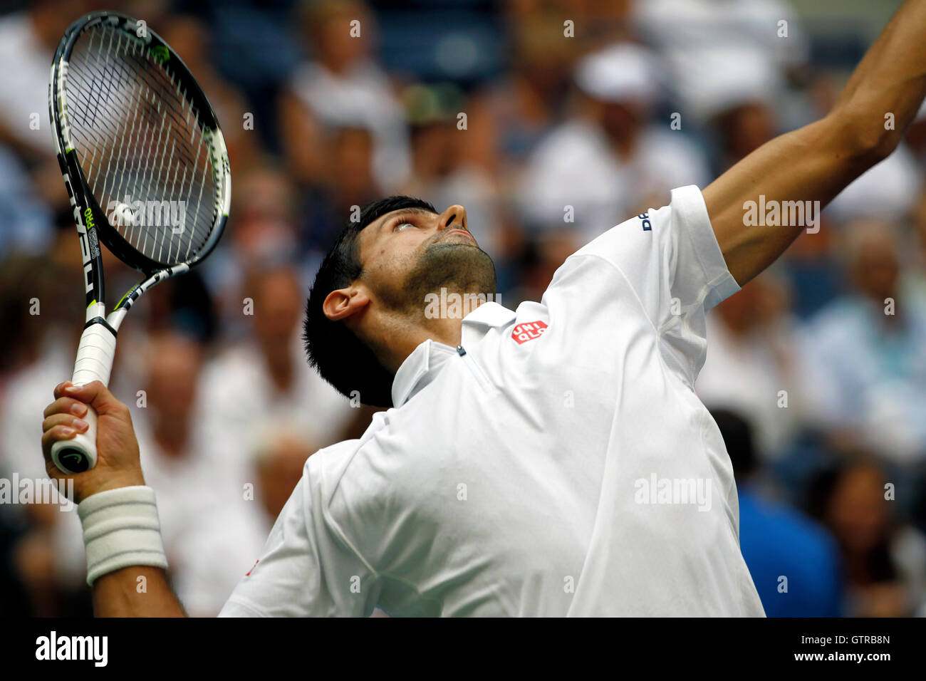 New York, United States. 09th Sep, 2016. Novak Djokovic serving during his semi final match against Gael Monfils of France at the United States Open Tennis Championships at Flushing Meadows, New York on Friday, September 9th. Djokovic won the match in four sets to advance to the final Credit: © Adam Stoltman/Alamy Live News  Stock Photo