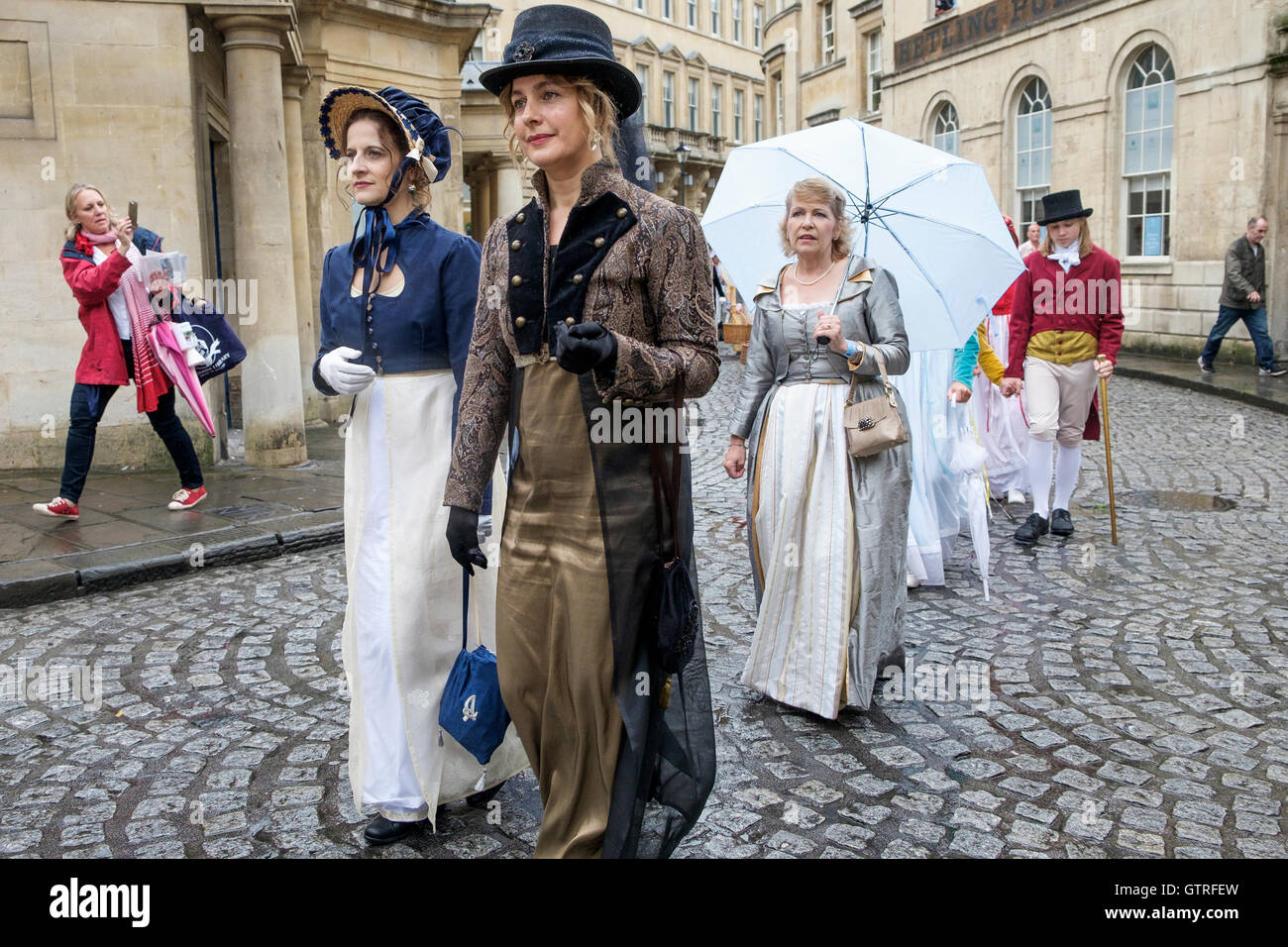 Bath, UK. 10th Sep, 2016. Jane Austen fans are pictured taking part in the world famous Grand Regency Costumed Promenade. The Promenade, part of the Jane Austen Festival is a procession through the streets of Bath and the participants who come from all over the world dress in 18th Century costume. Credit:  lynchpics/Alamy Live News Stock Photo