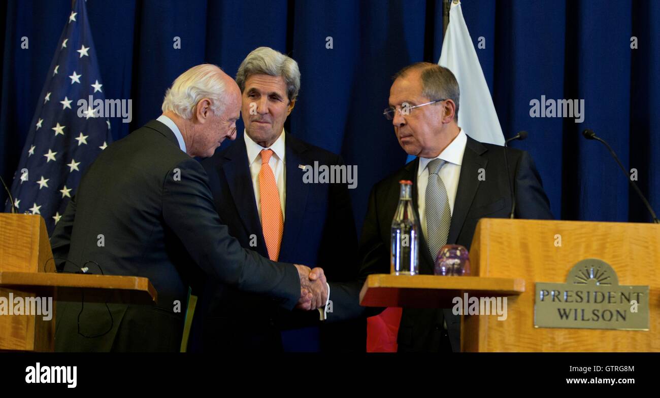 United Nations Special Envoy for Syria Staffan de Mistura shakes hands with Russian Foreign Minister Sergey Lavrov as U.S Secretary of State John Kerry looks on following a joint press conference at the Hotel President Wilson September 9, 2016 in Geneva, Switzerland. Russia and the United States steps that could lead to cessation of hostilities in Syria. Stock Photo