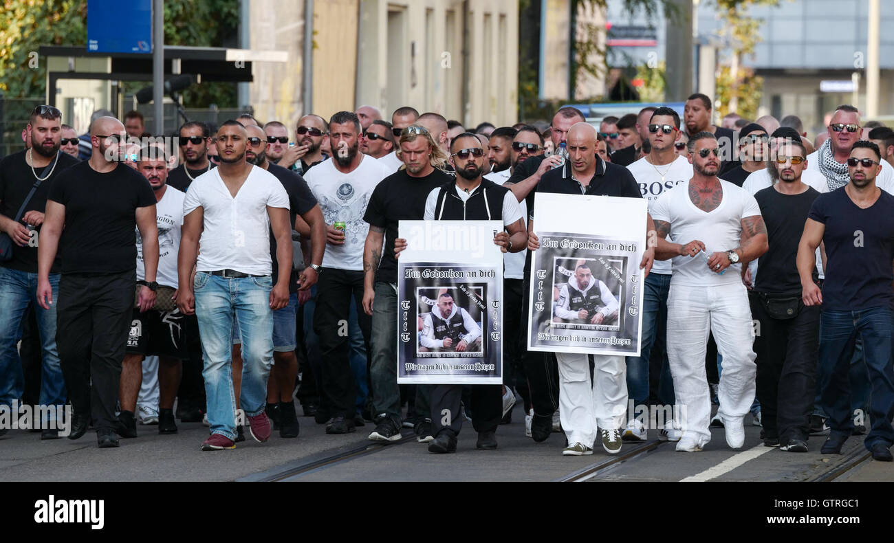 Leipzig, Germany. 10th Sep, 2016. Members of the biker club United Tribuns  during a memorial march in Leipzig, Germany, 10 September 2016. They are  commemorating a 27-year-old man (depicted on poster) who