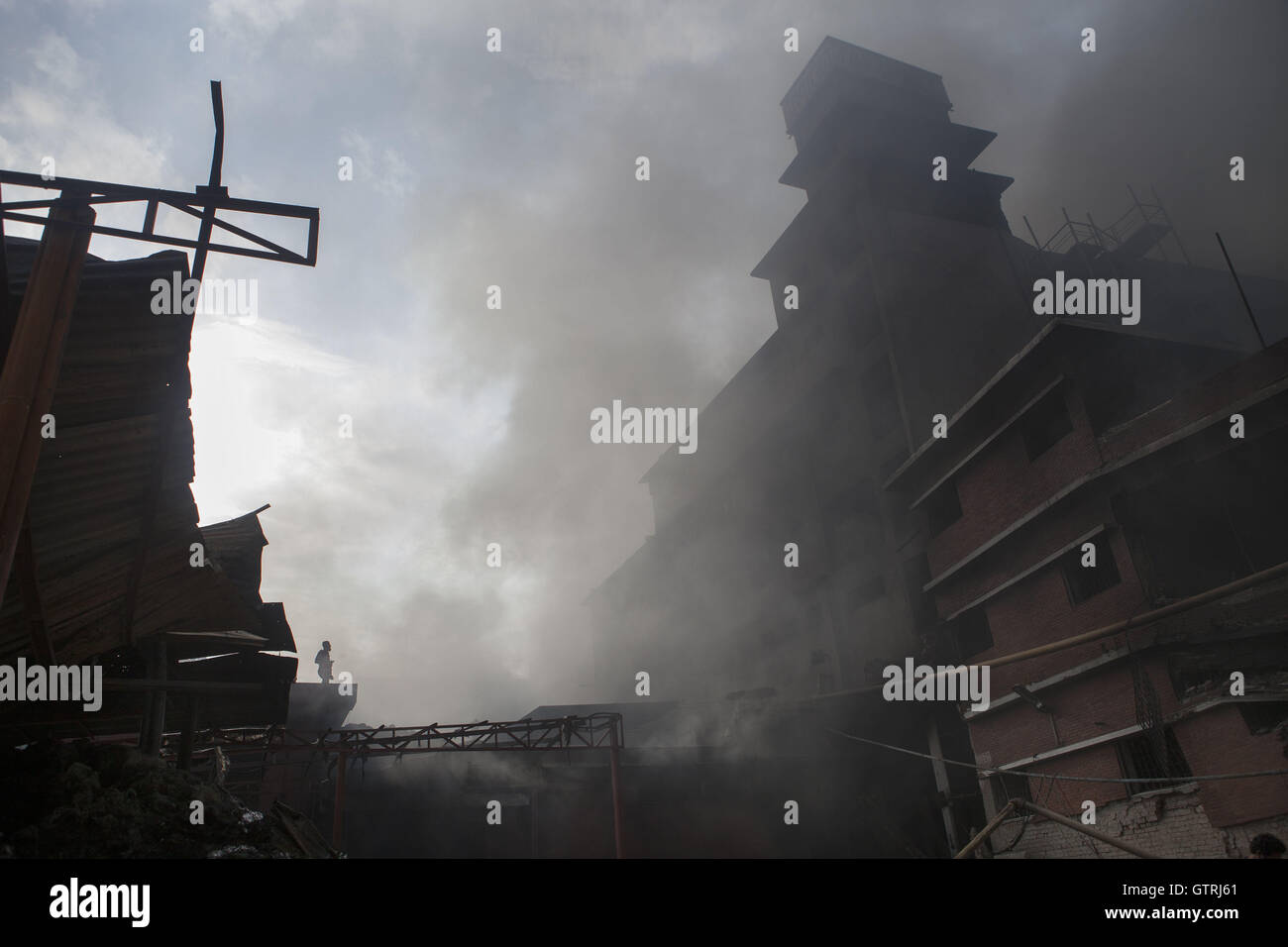 Gazipur, Dhaka, Bangladesh. 10th Sep, 2016. At least 24 people, mostly workers, have been killed and more than 50 injured in a boiler explosion that caused fire at a factory in Tongi, Gazipur, on Saturday morning. Credit:  Probal Rashid/ZUMA Wire/Alamy Live News Stock Photo