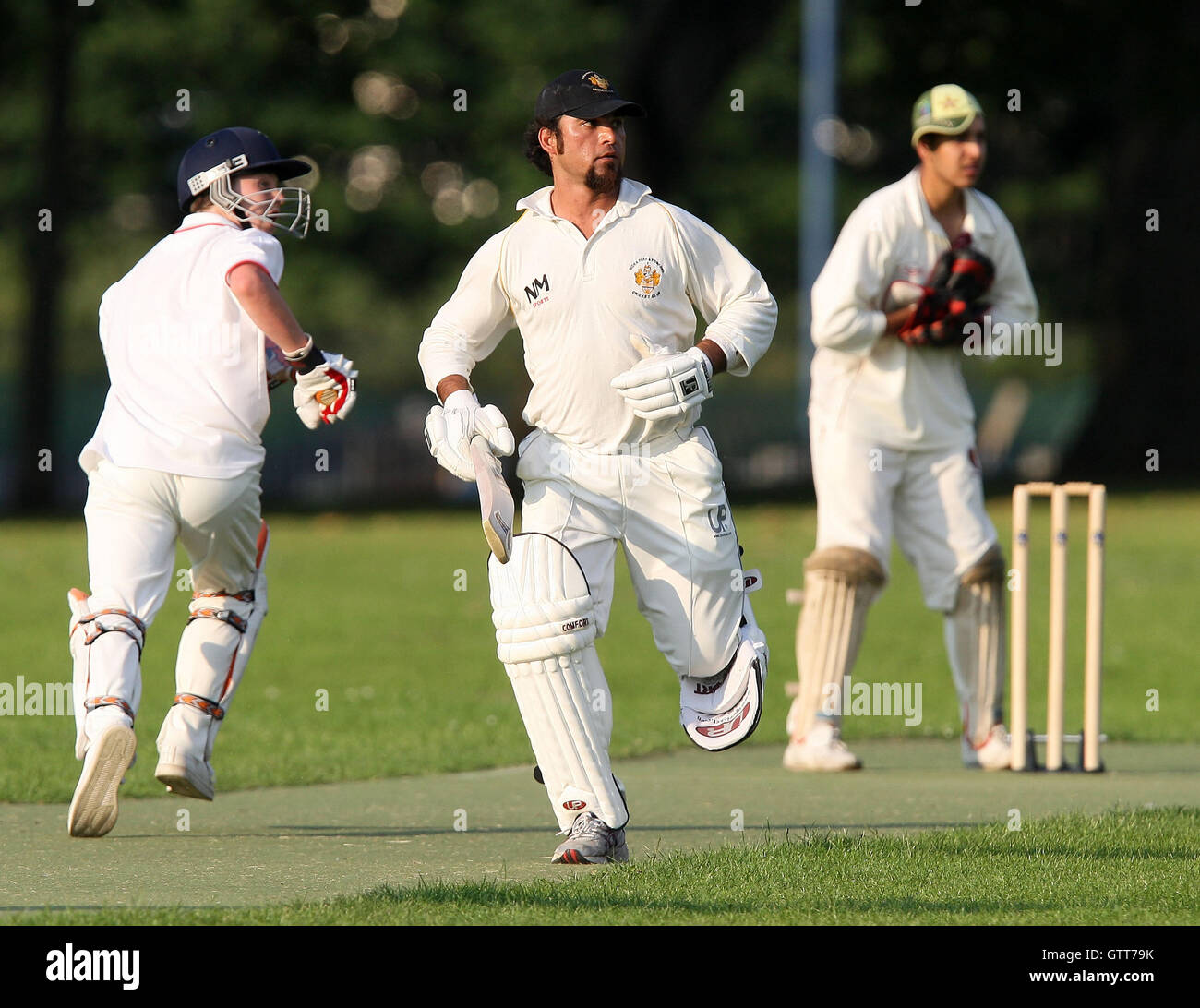 H Afridi (centre) and Scott both on their way to half-centuries for VPJ - Victoria Park Juniors vs Goodmayes - Victoria Park Community Cricket League - 09/06/08 Stock Photo