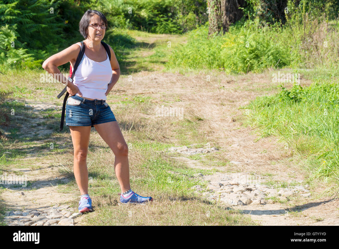 Mature woman trekking hi-res stock photography and images - Alamy