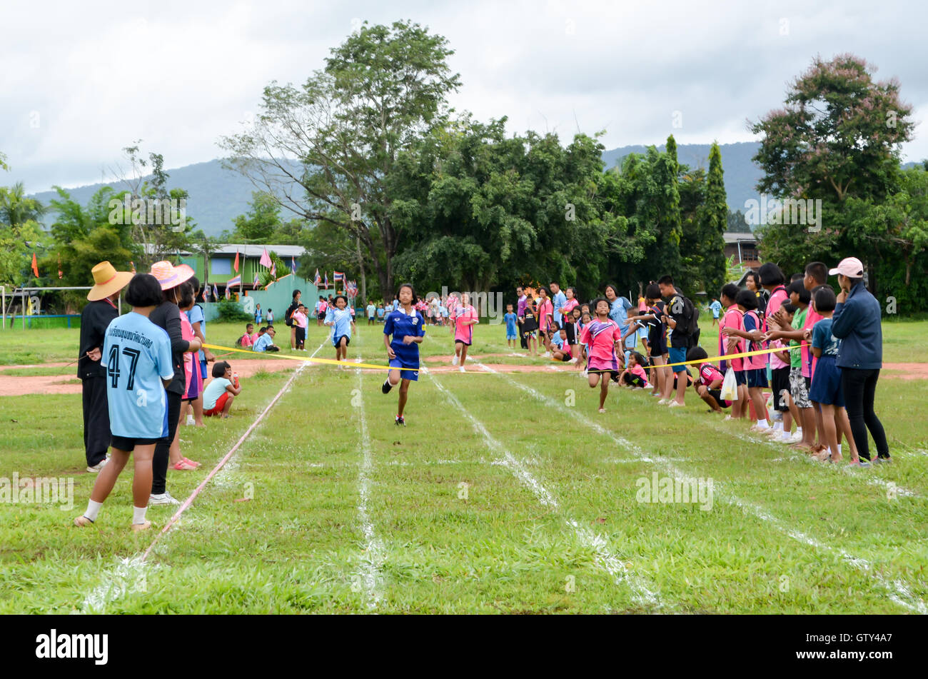 PHITSANULOK, THAILAND - SEP 1: Compete on 100 Meter Dash Final for children on Sep 1, 2016 at chumchon wat bandong school in Phi Stock Photo