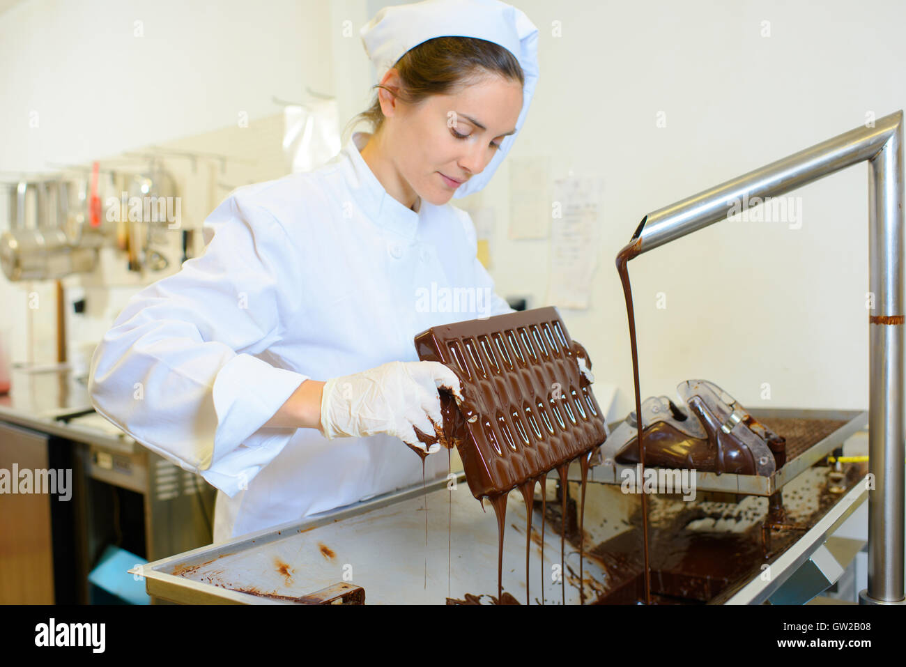 Chef making chocolate mould Stock Photo Alamy