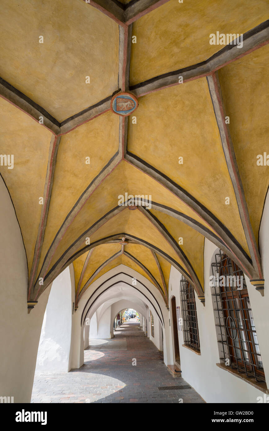 Vault passage with coats of arms of a medieval patrician house in the old town at Wasserburg am Inn,Bavaria,Germany Stock Photo