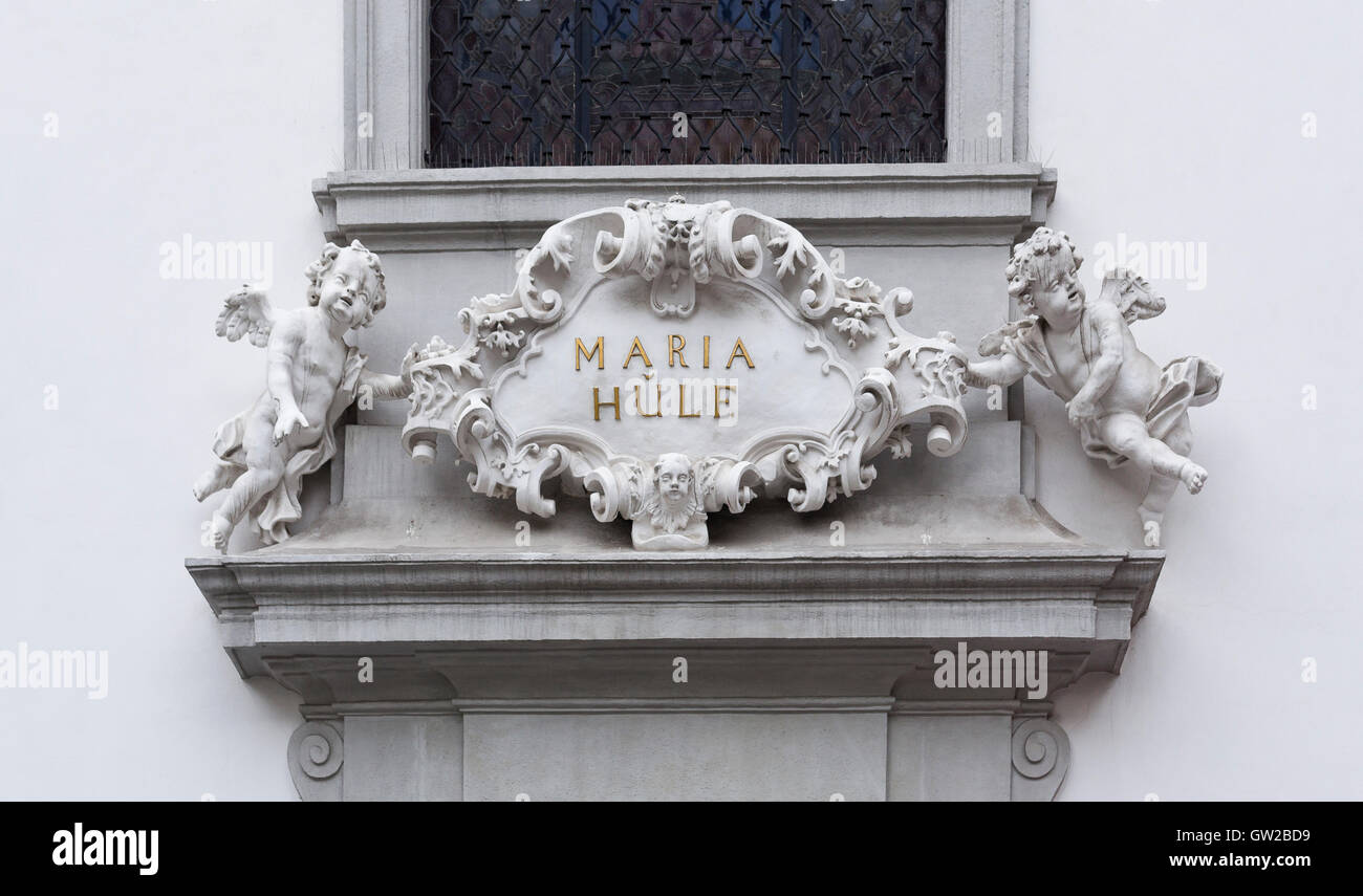 Detail of the church name, Maria Hulf, on a plate above the main entrance, in Vienna, Austria Stock Photo