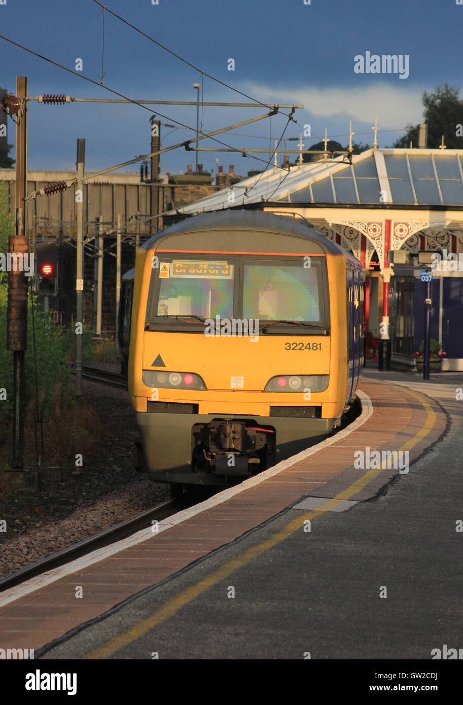 A Electric passenger train run by “Northern” waits to leave Skipton