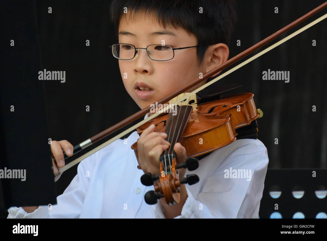 Beethovenfest Bonn, Germany, young boy playing violin on the market place Stock Photo