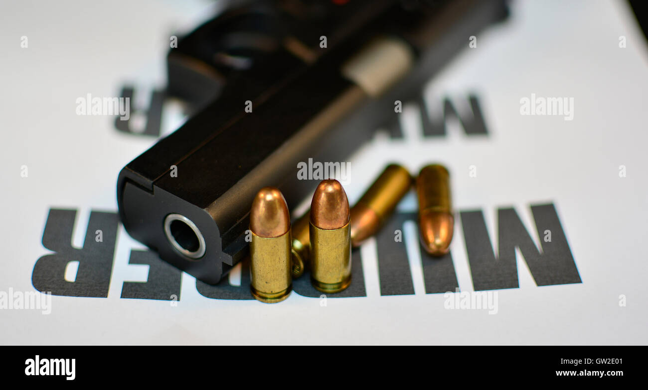 Crime Murder concept. Handgun with bullets gun violent crime, assault. Shooting. Stock Photo