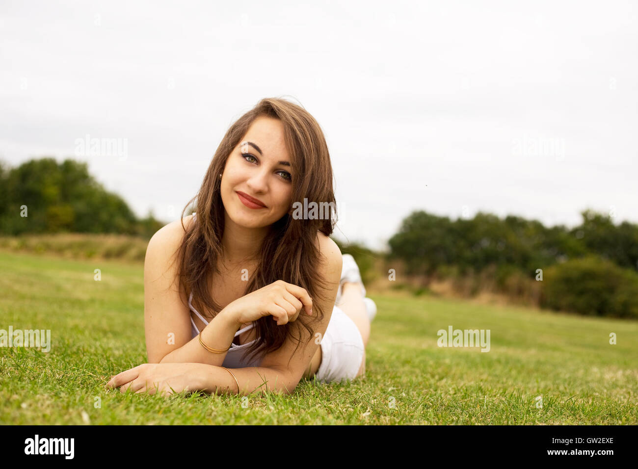 young woman enjoying a day in the park Stock Photo