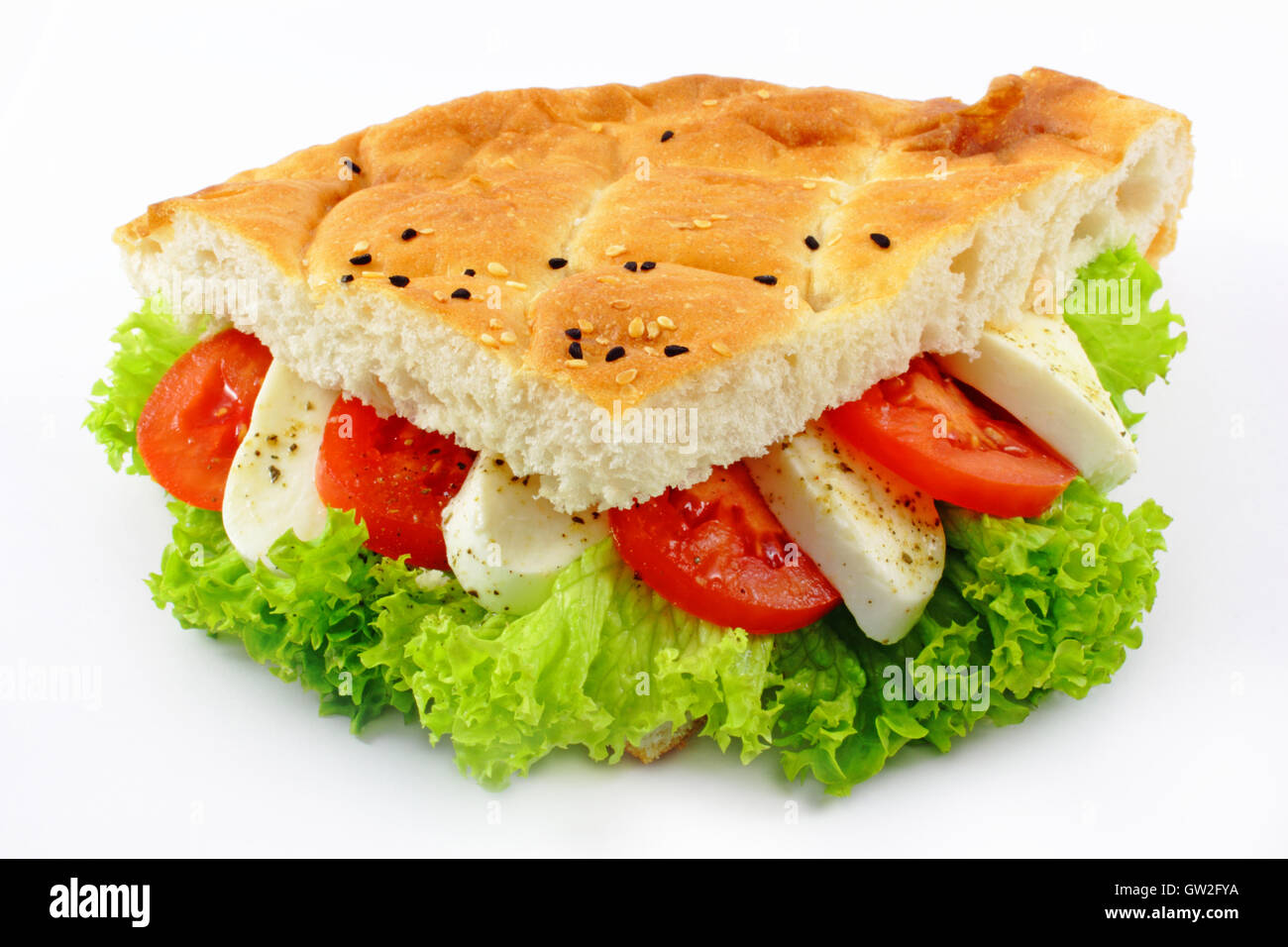 fresh pide bread with tomatoes, mozzarella cheese and salad Stock Photo