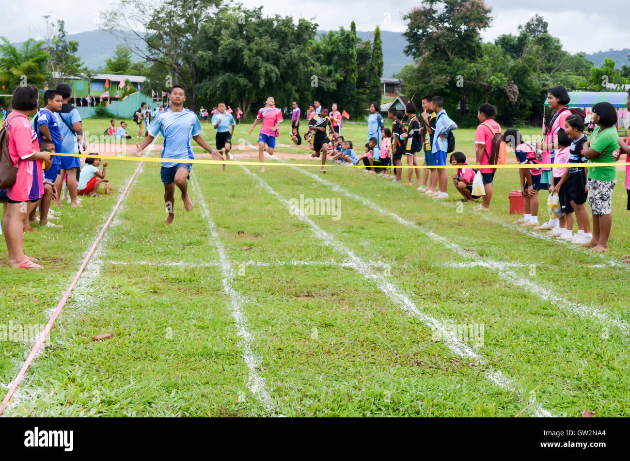 PHITSANULOK, THAILAND - SEP 1: Compete on 100 Meter Dash Final for children on Sep 1, 2016 at chumchon wat bandong school in Phi Stock Photo