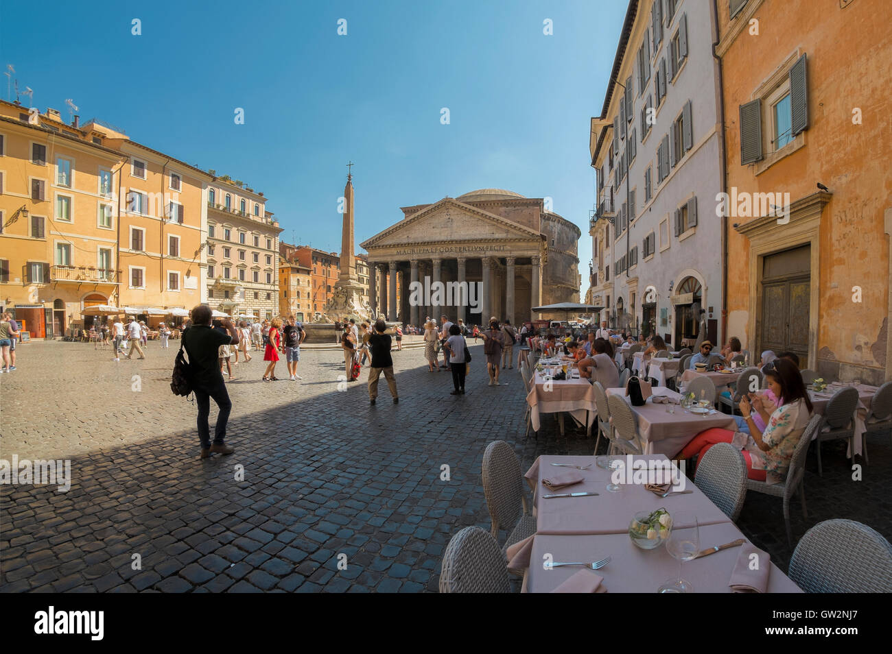 People dining in the Pantheon square in Rome, Italy Stock Photo