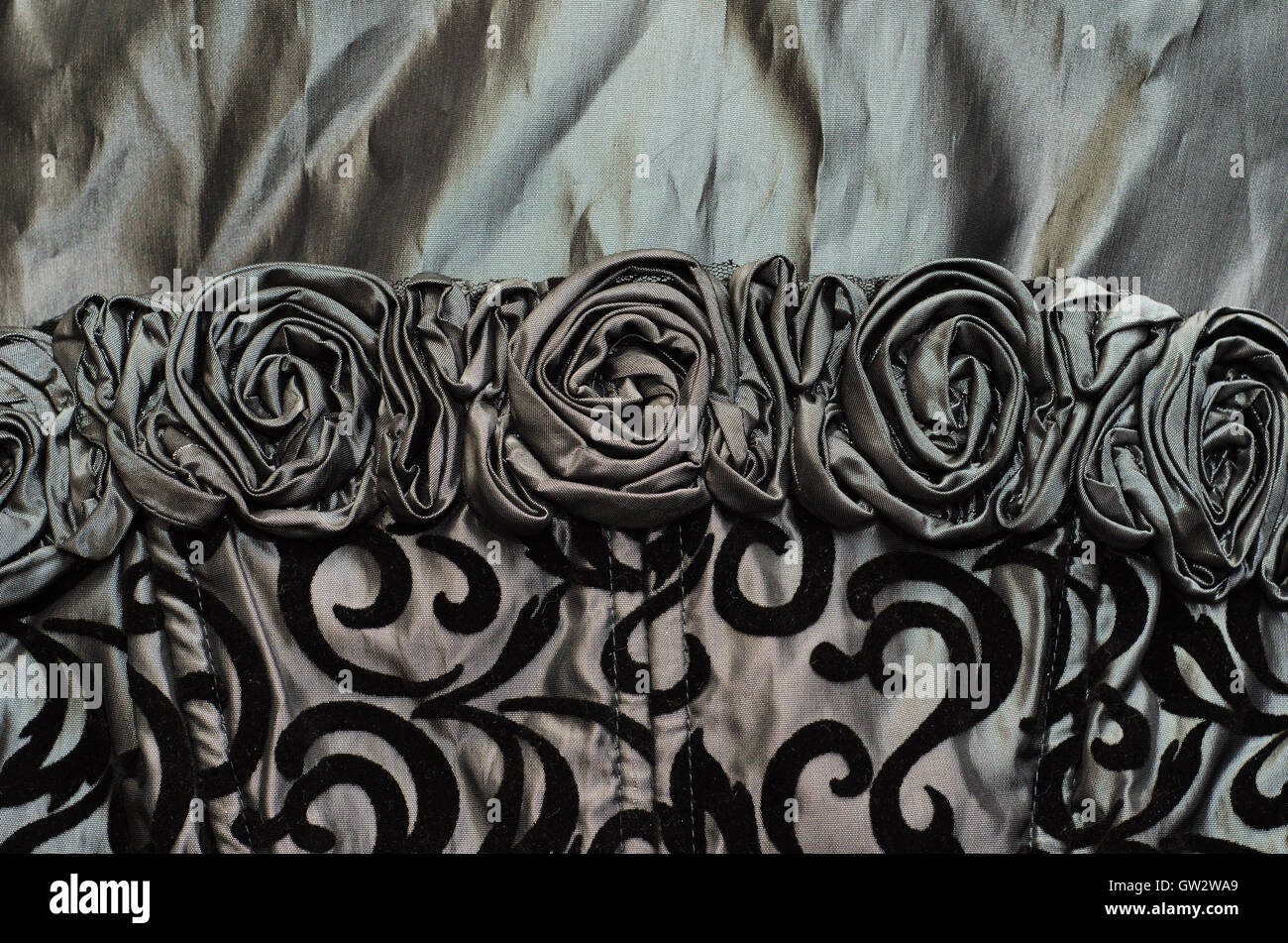 close up of black silk cloth with roses Stock Photo
