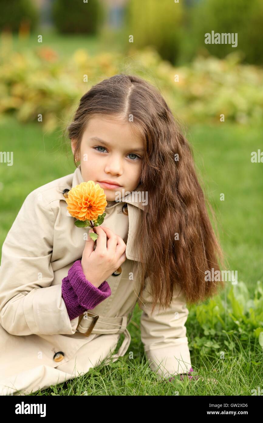 little girl in the autumn park Stock Photo - Alamy