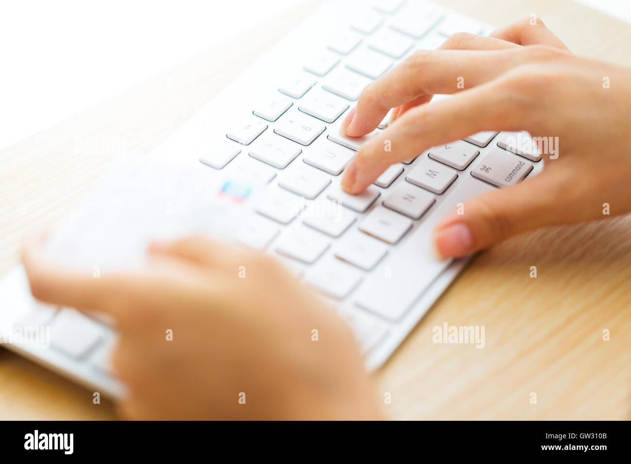 Online shopping with credit card and keyboard Stock Photo