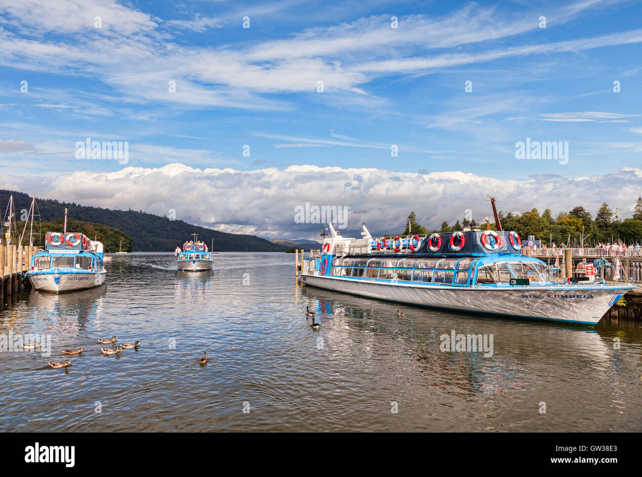 Cruise boats arriving at the pier on Lake Windermere, Lake District