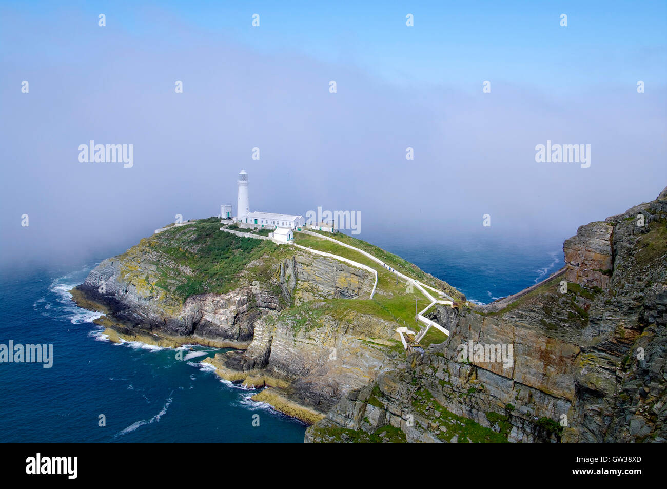 Sea mist rolling in at South Stack, Holyhead, Anglesey, Wales Stock Photo