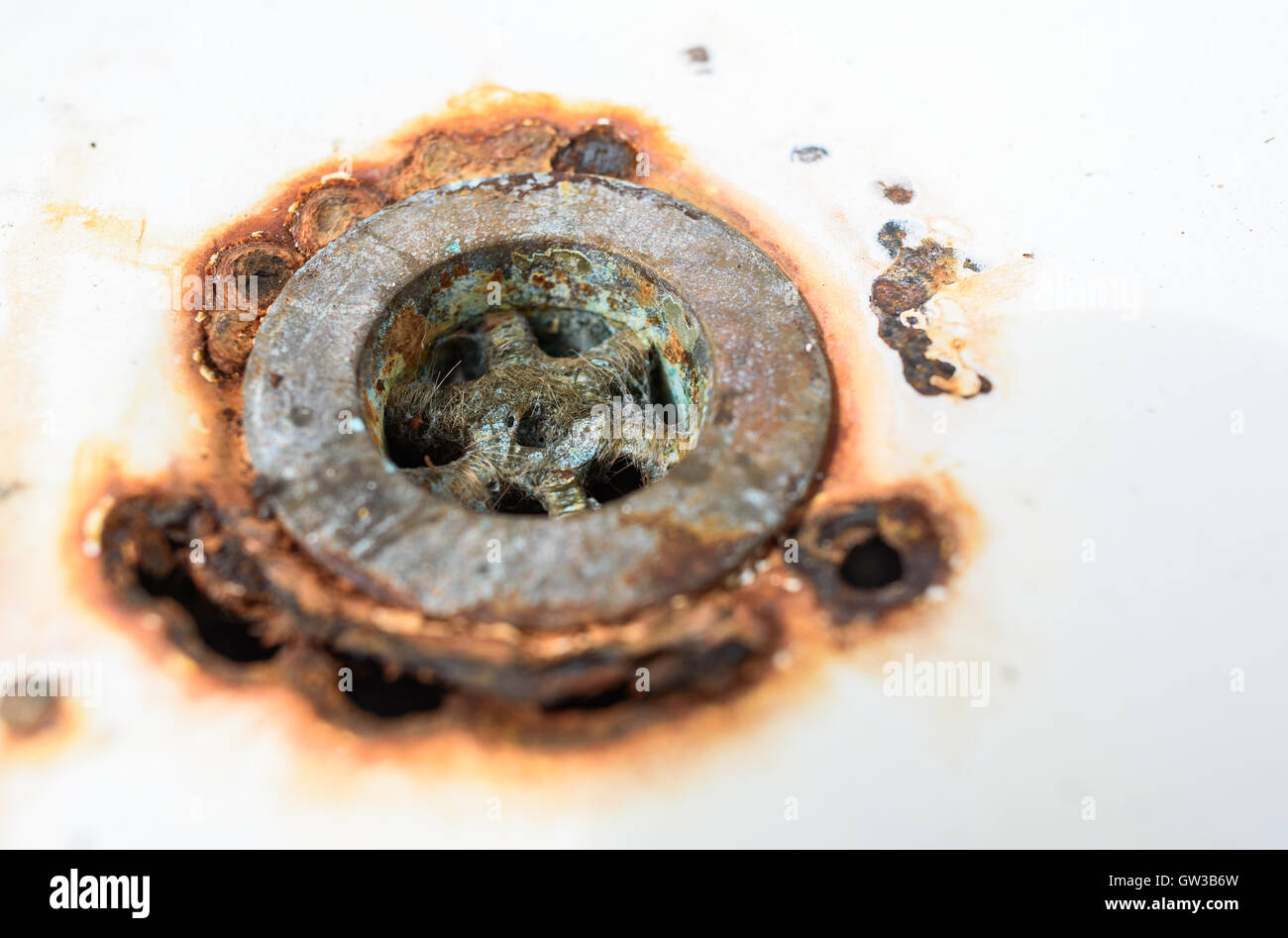 An old, rusty  enamel sink. Stock Photo