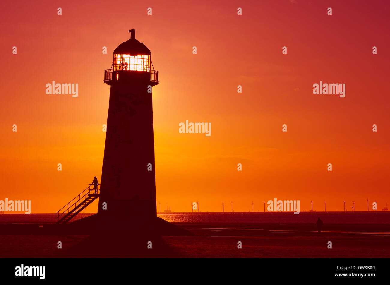 Talacre Lighthouse Point of Ayre at Sunset Stock Photo