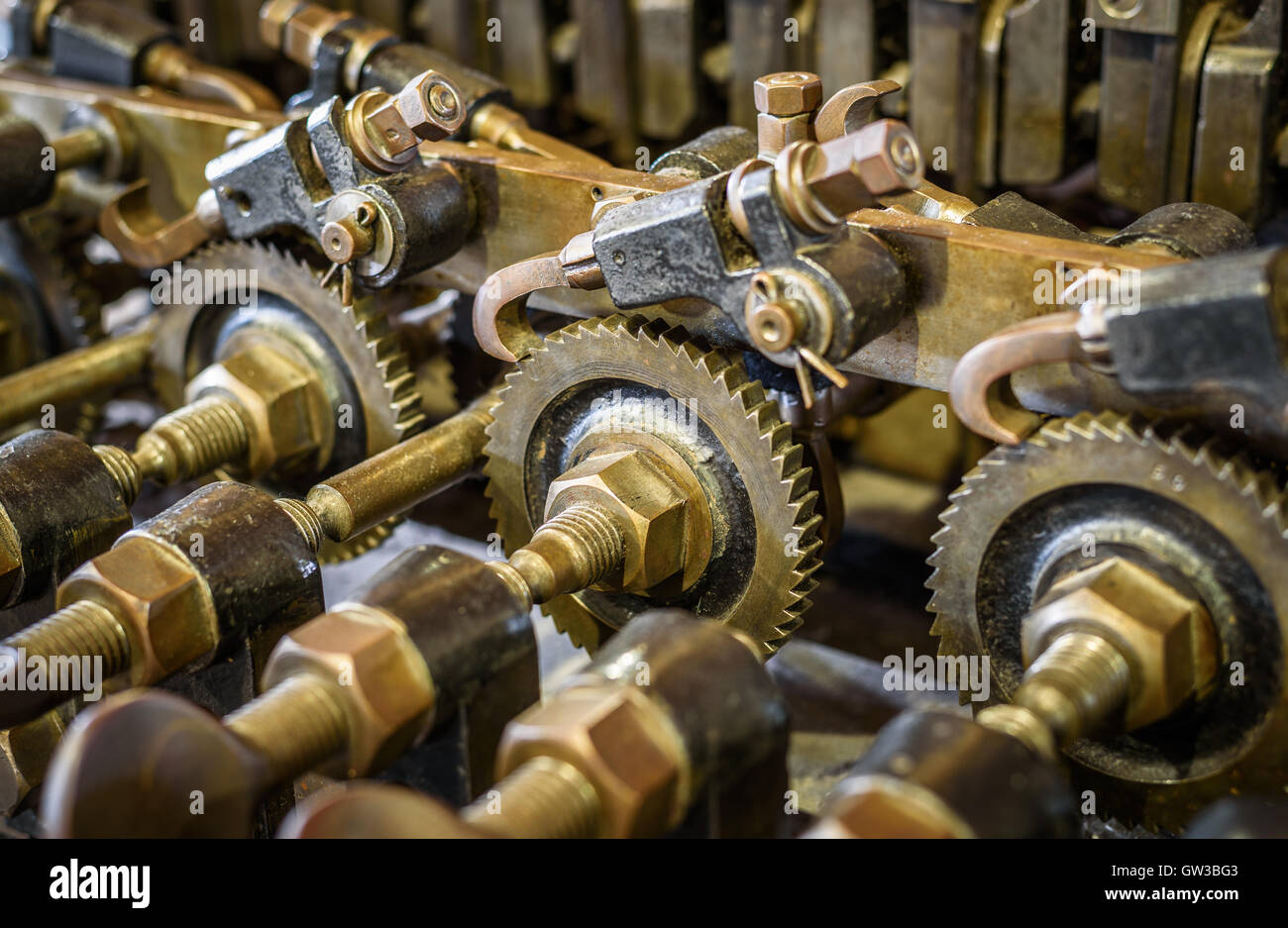 Detailed image of mechanical brass cog and ratchet mechanism Stock