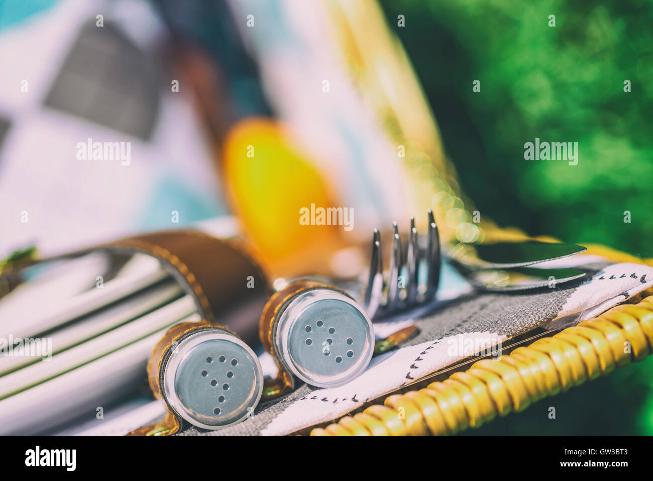 Salt And Pepper With Cutlery In Picnic Basket Stock Photo Alamy