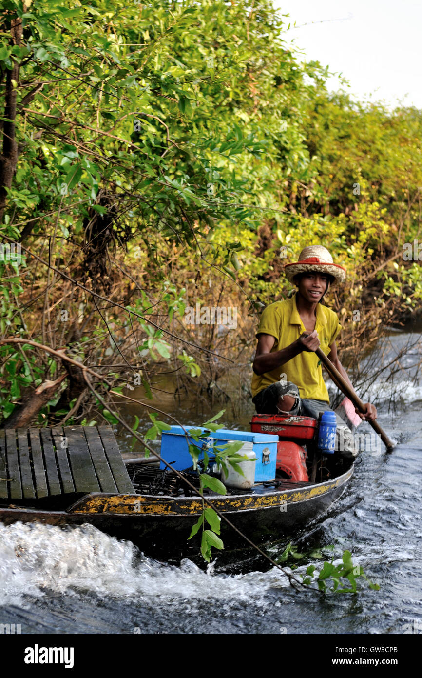 Man driving boat asia hi-res stock photography and images - Alamy