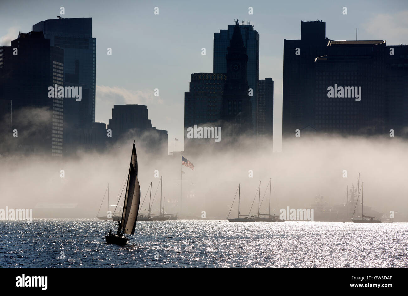 Fog on Boston Harbor and city skyline, Boston Massachusetts Stock Photo