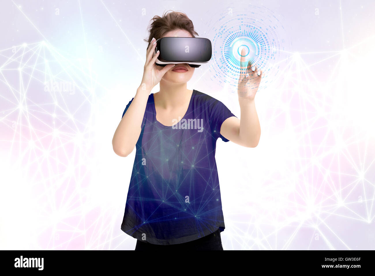 Young girl getting experience using VR headset glasses, is augmented ...