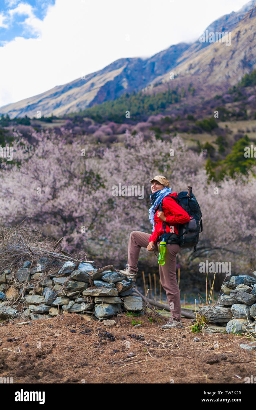 Young Pretty Woman Wearing Red Jacket Backpack Trail Mountains.Mountain