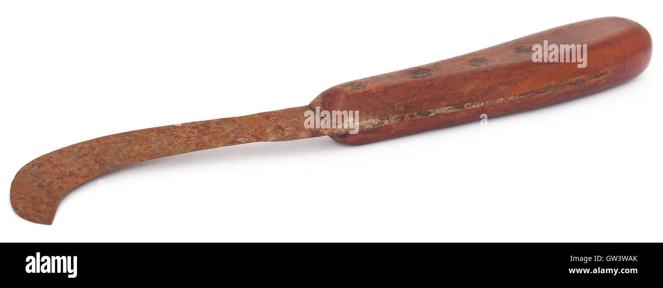 Rusty cutting tool of Bangladesh known as da over white background Stock Photo