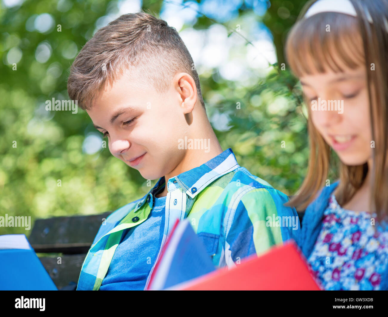 Children reading book Stock Photo