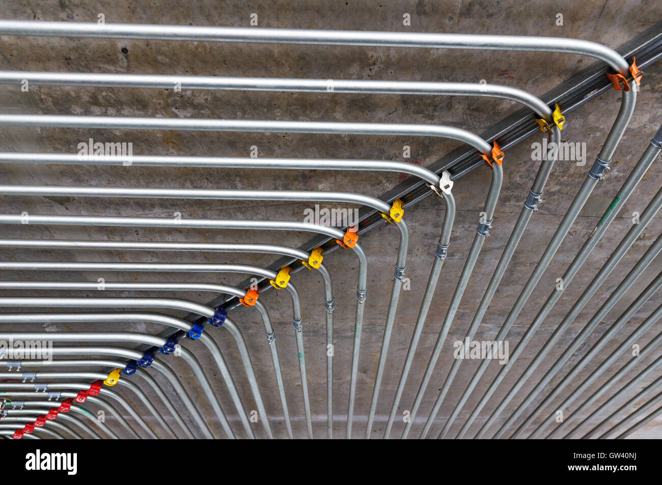 Pipes on ceiling wall Stock Photo Alamy