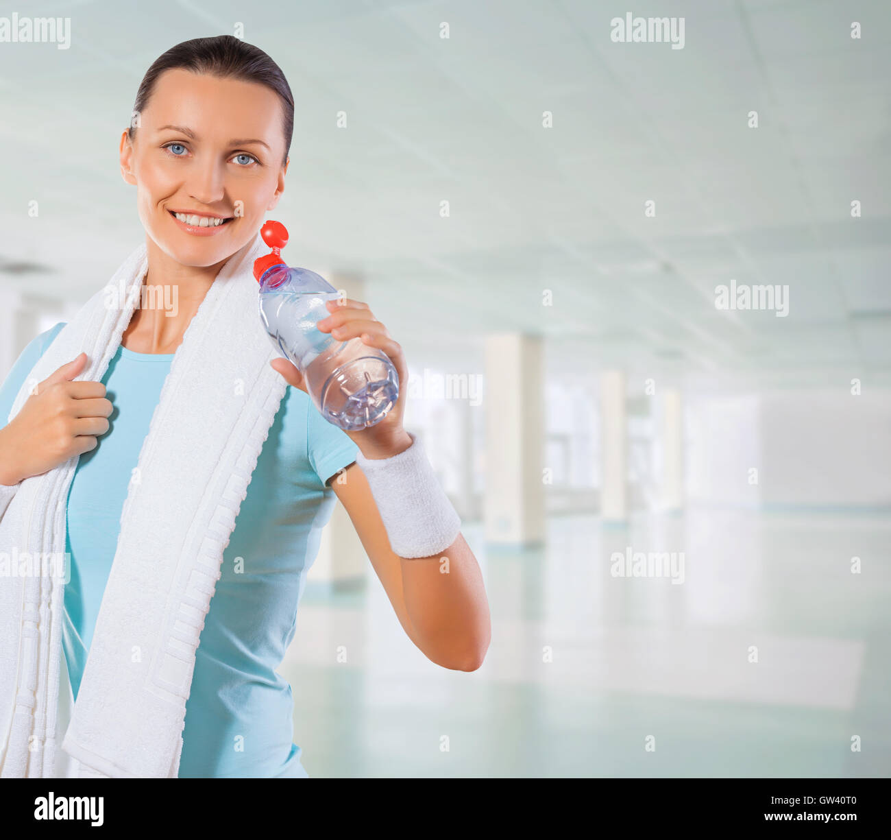 copyspace image of sportswoman holding bottle of water Stock Photo - Alamy