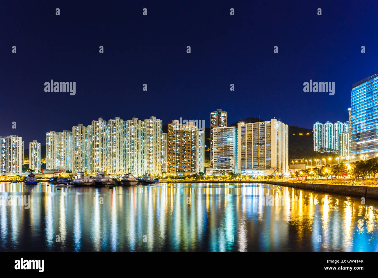 Apartment building in Hong Kong at night Stock Photo - Alamy
