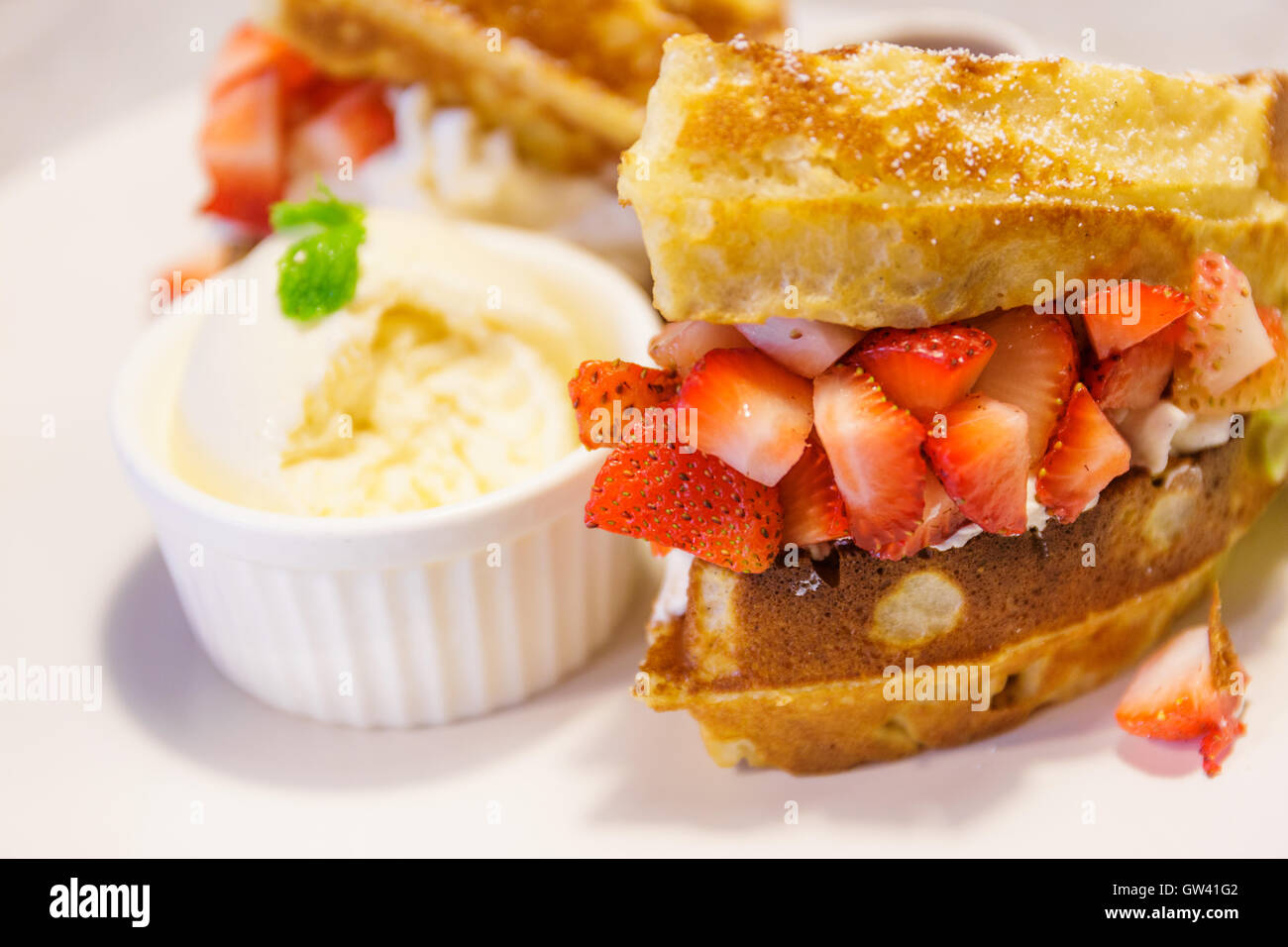 Waffles with strawberries Stock Photo - Alamy