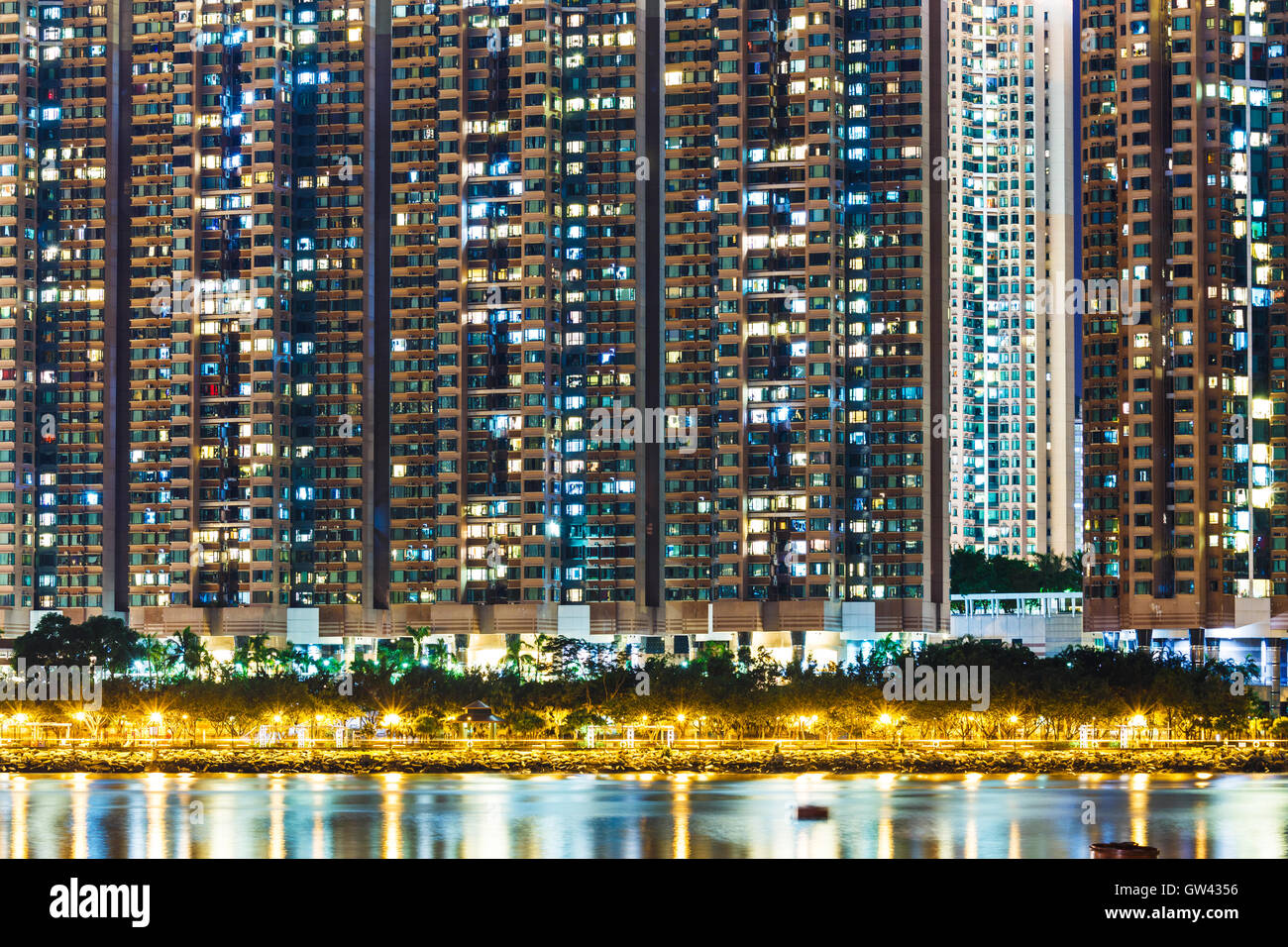 Residential building in Hong Kong at night Stock Photo - Alamy