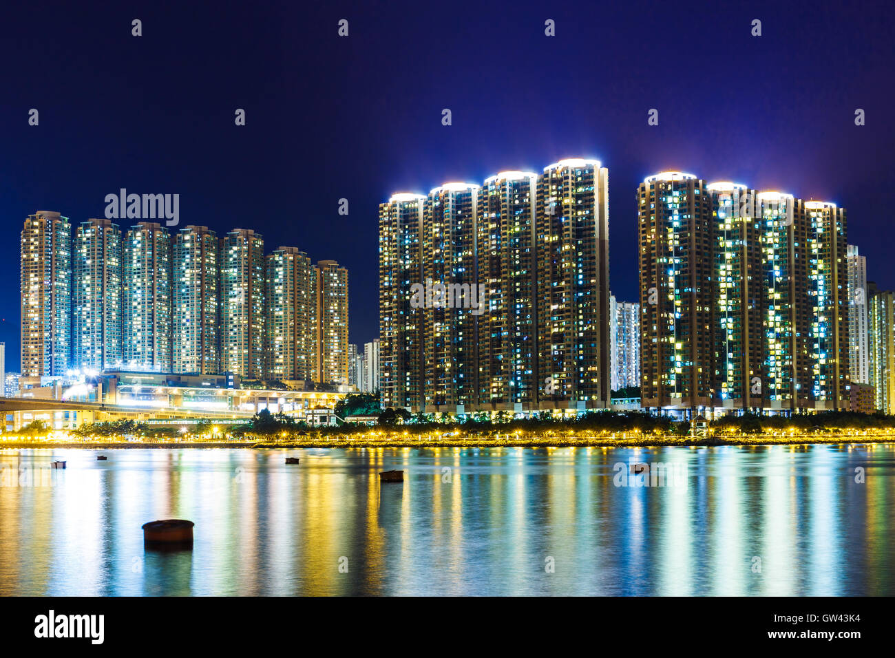Apartment building in Hong Kong at night Stock Photo - Alamy