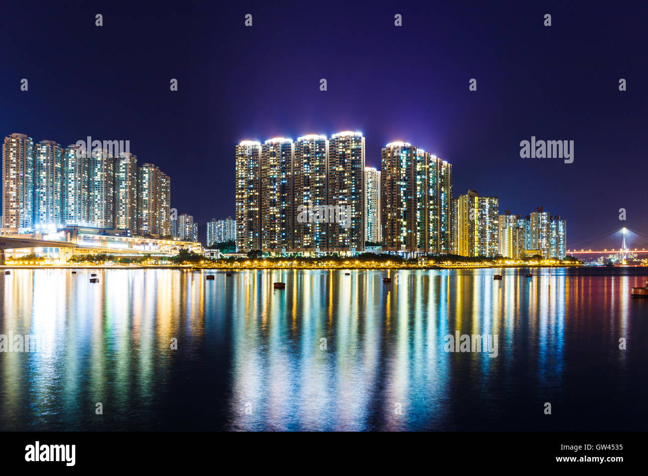 Apartment building in Hong Kong at night Stock Photo - Alamy