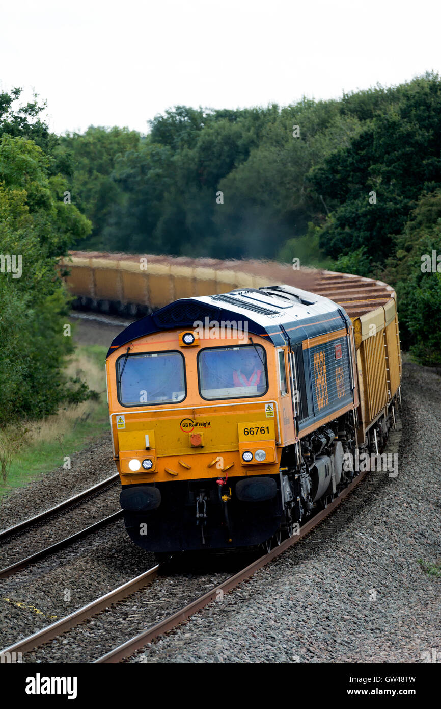 GBRf empty stone train pulled by a class 66 diesel locomotive at Hatton, Warwickshire, UK Stock Photo
