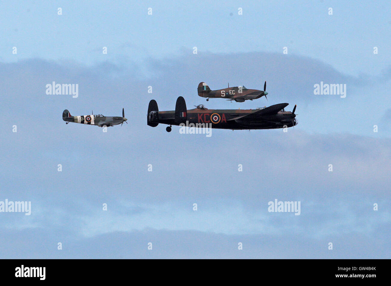 The Battle of Britain Memorial Flight including a Lancaster bomber, a Spitfire and a Hurricane fly down the River Mersey towards Southport, to take part in the Southport Airshow. Stock Photo